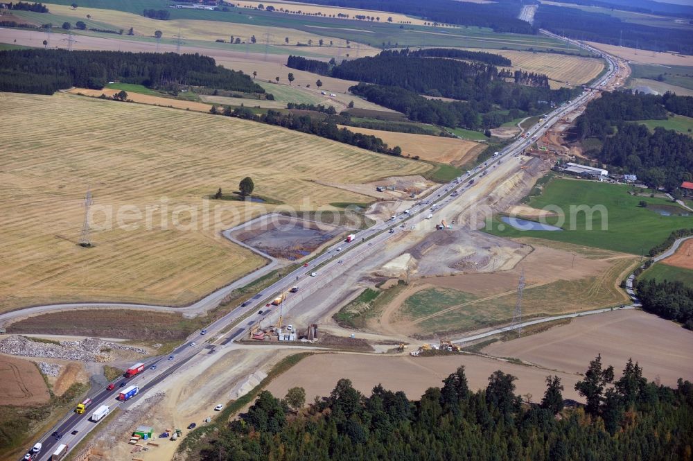 Aerial photograph Schleiz - Buildings and route of the motorway A9 motorway with four lanes now. Currently, reconstruction, expansion and new construction work is underway for the six-lane expansion of Highway 9 between Triptis and Schleiz by Wayss & Freytag Ingenieurbau and EUROVIA VINCI in Thuringia