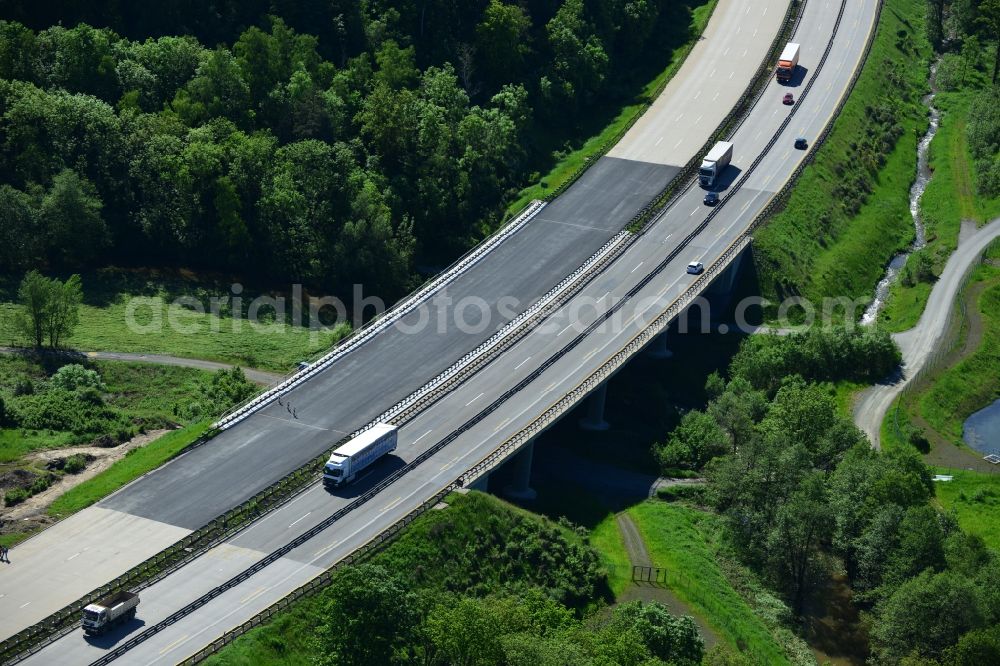 Aerial image Schleiz - Buildings and route of the motorway A9 motorway with four lanes now. Currently, reconstruction, expansion and new construction work is underway for the six-lane expansion of Highway 9 between Triptis and Schleiz by Wayss & Freytag Ingenieurbau and EUROVIA VINCI in Thuringia