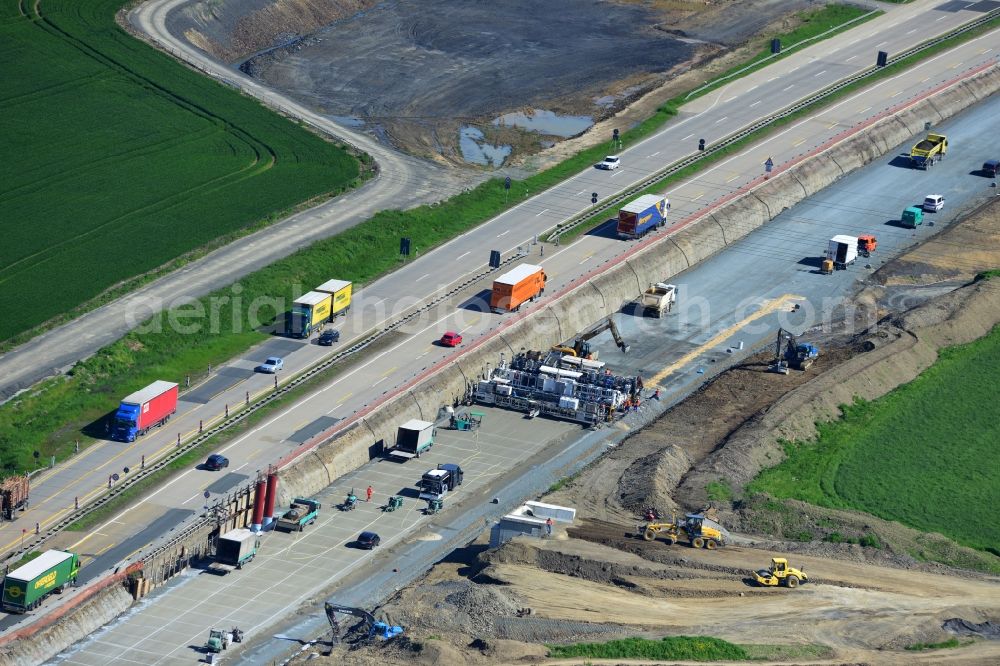 Schleiz from above - Buildings and route of the motorway A9 motorway with four lanes now. Currently, reconstruction, expansion and new construction work is underway for the six-lane expansion of Highway 9 between Triptis and Schleiz by Wayss & Freytag Ingenieurbau and EUROVIA VINCI in Thuringia