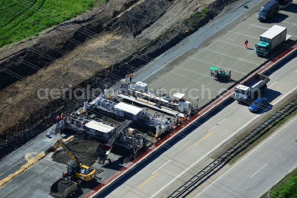 Schleiz from above - Buildings and route of the motorway A9 motorway with four lanes now. Currently, reconstruction, expansion and new construction work is underway for the six-lane expansion of Highway 9 between Triptis and Schleiz by Wayss & Freytag Ingenieurbau and EUROVIA VINCI in Thuringia