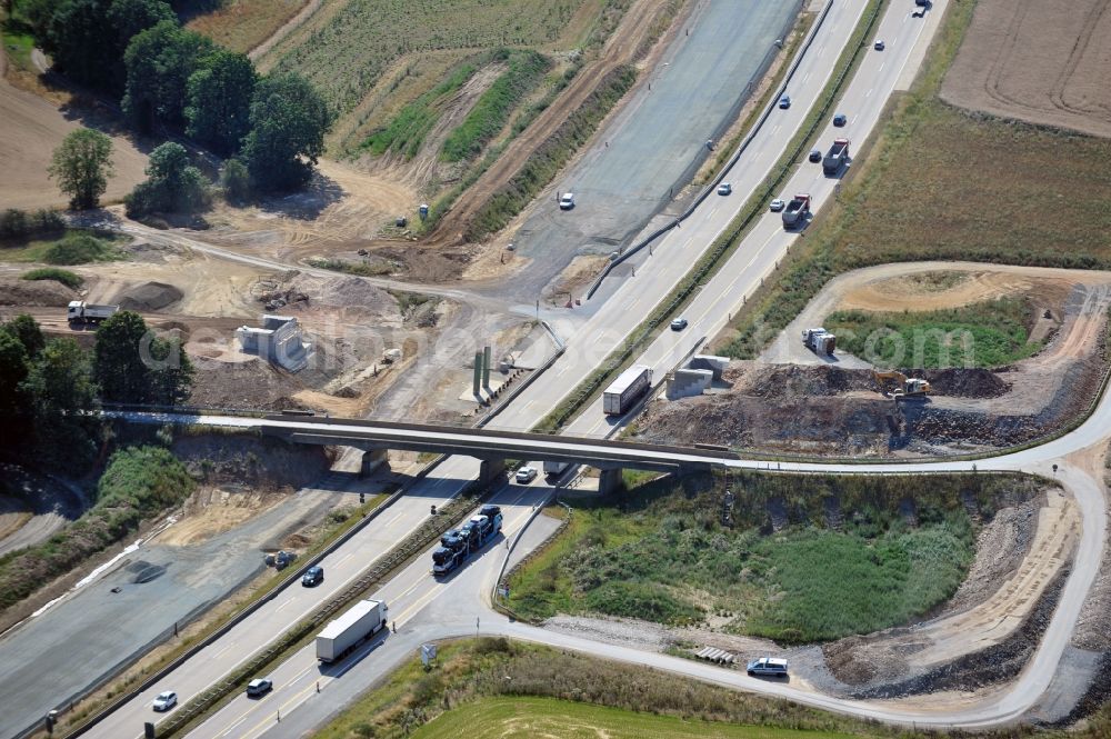 Triptis from above - Buildings and route of the motorway A9 motorway with four lanes now. Currently, reconstruction, expansion and new construction work is underway for the six-lane expansion of Highway 9 between Triptis and Schleiz by Wayss & Freytag Ingenieurbau and EUROVIA VINCI in Thuringia