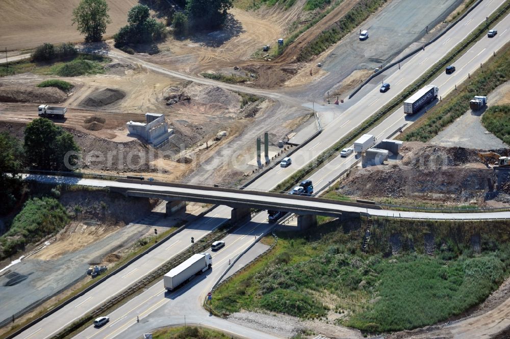 Triptis from the bird's eye view: Buildings and route of the motorway A9 motorway with four lanes now. Currently, reconstruction, expansion and new construction work is underway for the six-lane expansion of Highway 9 between Triptis and Schleiz by Wayss & Freytag Ingenieurbau and EUROVIA VINCI in Thuringia