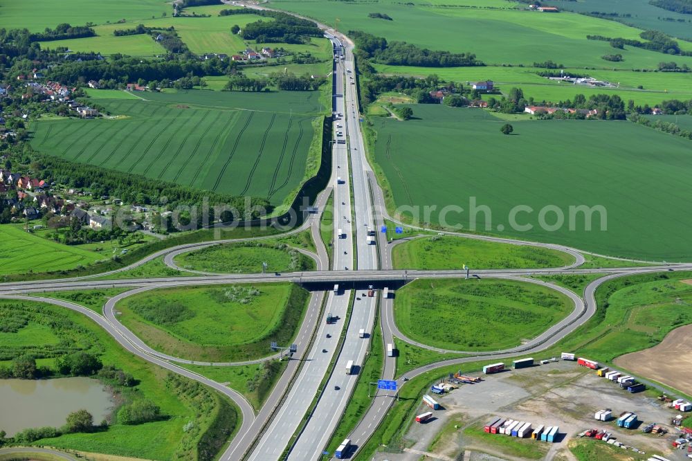 Triptis from above - Buildings and route of the motorway A9 motorway with four lanes now. Currently, reconstruction, expansion and new construction work is underway for the six-lane expansion of Highway 9 between Triptis and Schleiz by Wayss & Freytag Ingenieurbau and EUROVIA VINCI in Thuringia