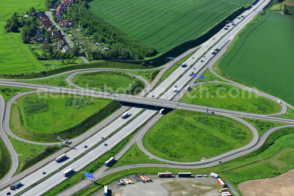 Triptis from the bird's eye view: Buildings and route of the motorway A9 motorway with four lanes now. Currently, reconstruction, expansion and new construction work is underway for the six-lane expansion of Highway 9 between Triptis and Schleiz by Wayss & Freytag Ingenieurbau and EUROVIA VINCI in Thuringia