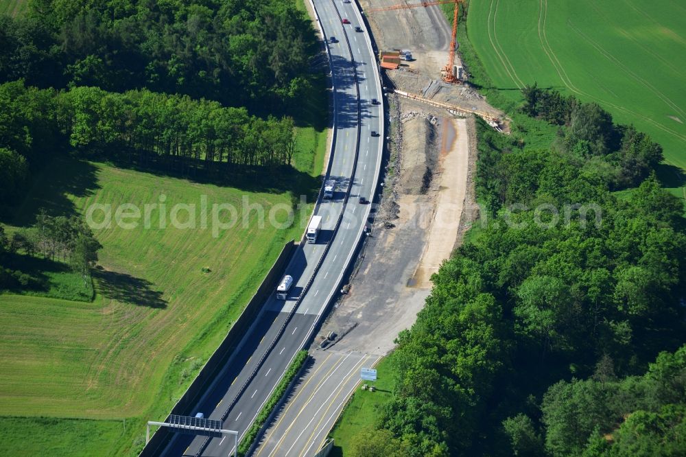 Triptis from above - Buildings and route of the motorway A9 motorway with four lanes now. Currently, reconstruction, expansion and new construction work is underway for the six-lane expansion of Highway 9 between Triptis and Schleiz by Wayss & Freytag Ingenieurbau and EUROVIA VINCI in Thuringia