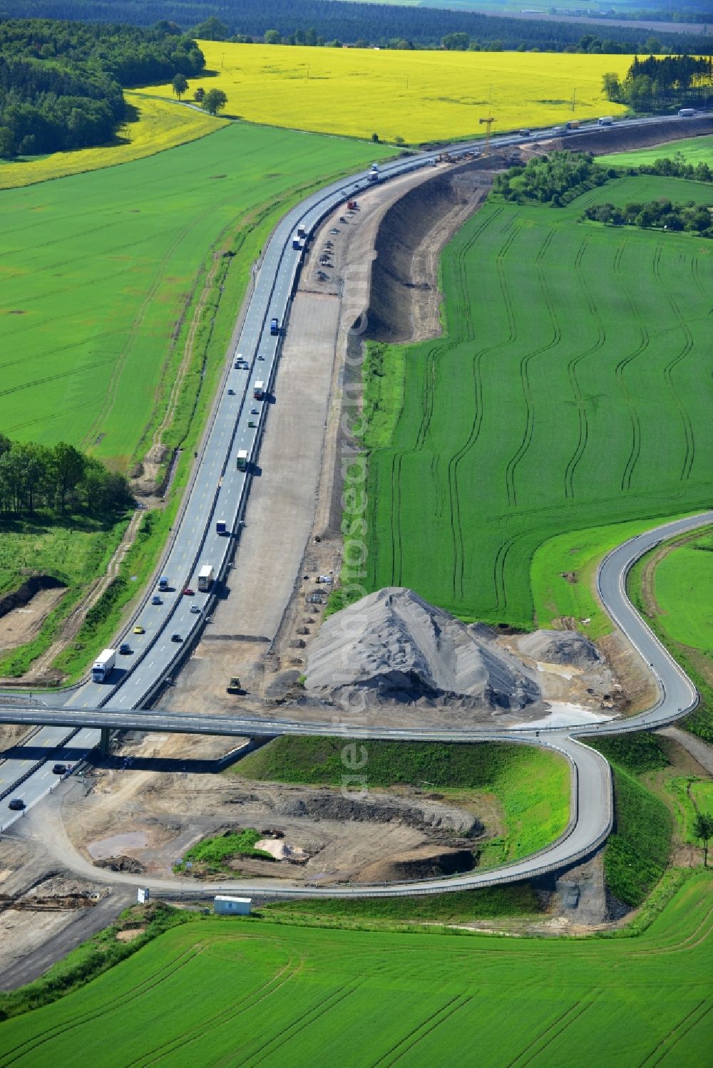 Triptis from above - Buildings and route of the motorway A9 motorway with four lanes now. Currently, reconstruction, expansion and new construction work is underway for the six-lane expansion of Highway 9 between Triptis and Schleiz by Wayss & Freytag Ingenieurbau and EUROVIA VINCI in Thuringia