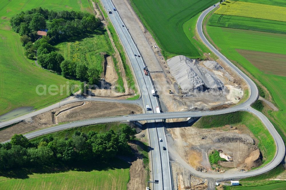 Aerial image Triptis - Buildings and route of the motorway A9 motorway with four lanes now. Currently, reconstruction, expansion and new construction work is underway for the six-lane expansion of Highway 9 between Triptis and Schleiz by Wayss & Freytag Ingenieurbau and EUROVIA VINCI in Thuringia