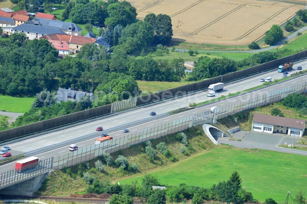 Triptis from above - Buildings and route of the motorway A9 motorway with four lanes now. Currently, reconstruction, expansion and new construction work is underway for the six-lane expansion of Highway 9 between Triptis and Schleiz by Wayss & Freytag Ingenieurbau and EUROVIA VINCI in Thuringia