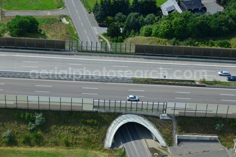 Aerial photograph Triptis - Buildings and route of the motorway A9 motorway with four lanes now. Currently, reconstruction, expansion and new construction work is underway for the six-lane expansion of Highway 9 between Triptis and Schleiz by Wayss & Freytag Ingenieurbau and EUROVIA VINCI in Thuringia