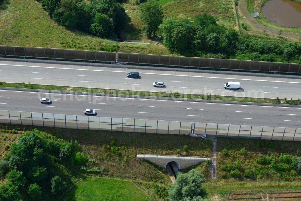 Triptis from the bird's eye view: Buildings and route of the motorway A9 motorway with four lanes now. Currently, reconstruction, expansion and new construction work is underway for the six-lane expansion of Highway 9 between Triptis and Schleiz by Wayss & Freytag Ingenieurbau and EUROVIA VINCI in Thuringia