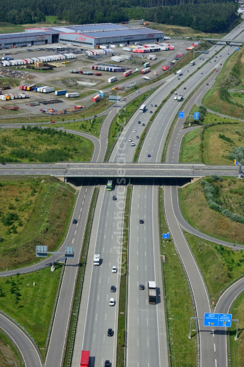 Aerial photograph Triptis - Buildings and route of the motorway A9 motorway with four lanes now. Currently, reconstruction, expansion and new construction work is underway for the six-lane expansion of Highway 9 between Triptis and Schleiz by Wayss & Freytag Ingenieurbau and EUROVIA VINCI in Thuringia