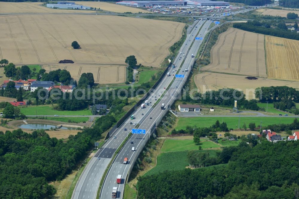 Aerial photograph Triptis - Buildings and route of the motorway A9 motorway with four lanes now. Currently, reconstruction, expansion and new construction work is underway for the six-lane expansion of Highway 9 between Triptis and Schleiz by Wayss & Freytag Ingenieurbau and EUROVIA VINCI in Thuringia