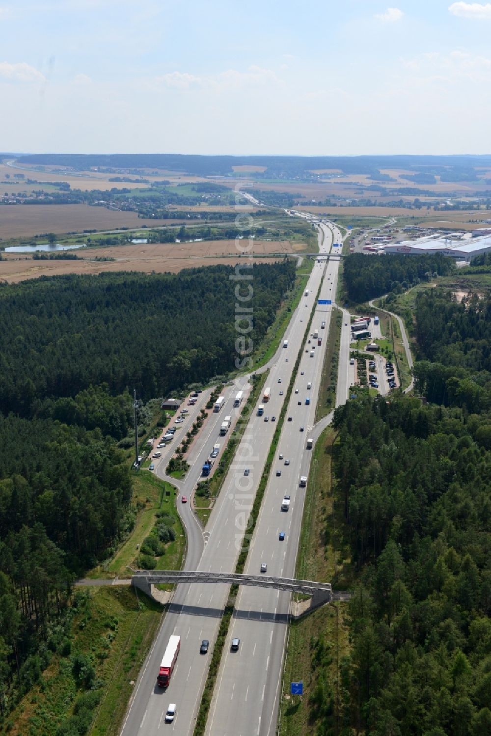 Triptis from above - Buildings and route of the motorway A9 motorway with four lanes now. Currently, reconstruction, expansion and new construction work is underway for the six-lane expansion of Highway 9 between Triptis and Schleiz by Wayss & Freytag Ingenieurbau and EUROVIA VINCI in Thuringia