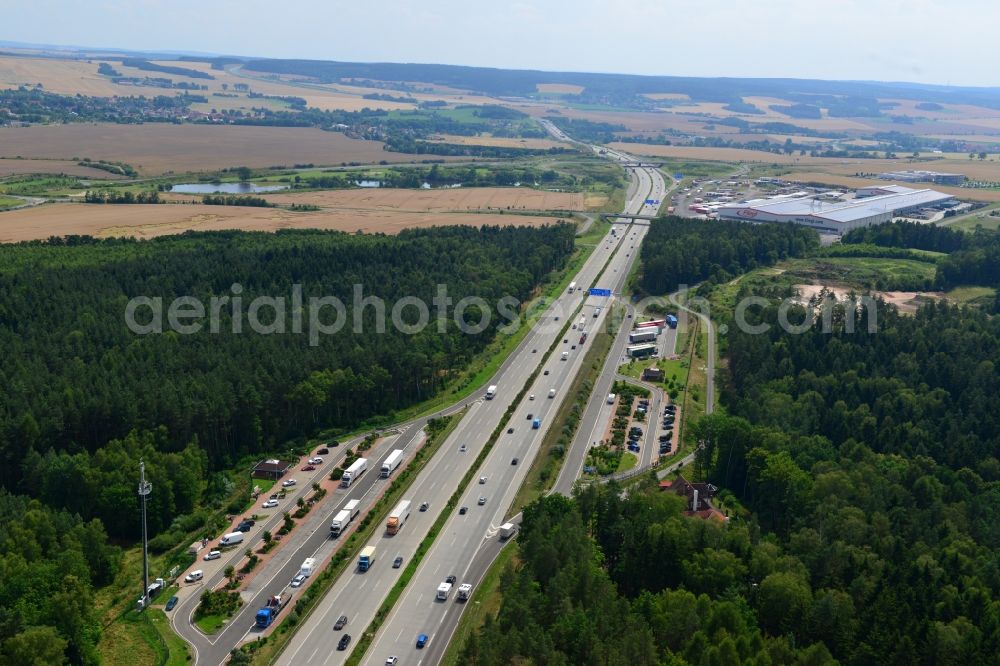 Triptis from the bird's eye view: Buildings and route of the motorway A9 motorway with four lanes now. Currently, reconstruction, expansion and new construction work is underway for the six-lane expansion of Highway 9 between Triptis and Schleiz by Wayss & Freytag Ingenieurbau and EUROVIA VINCI in Thuringia