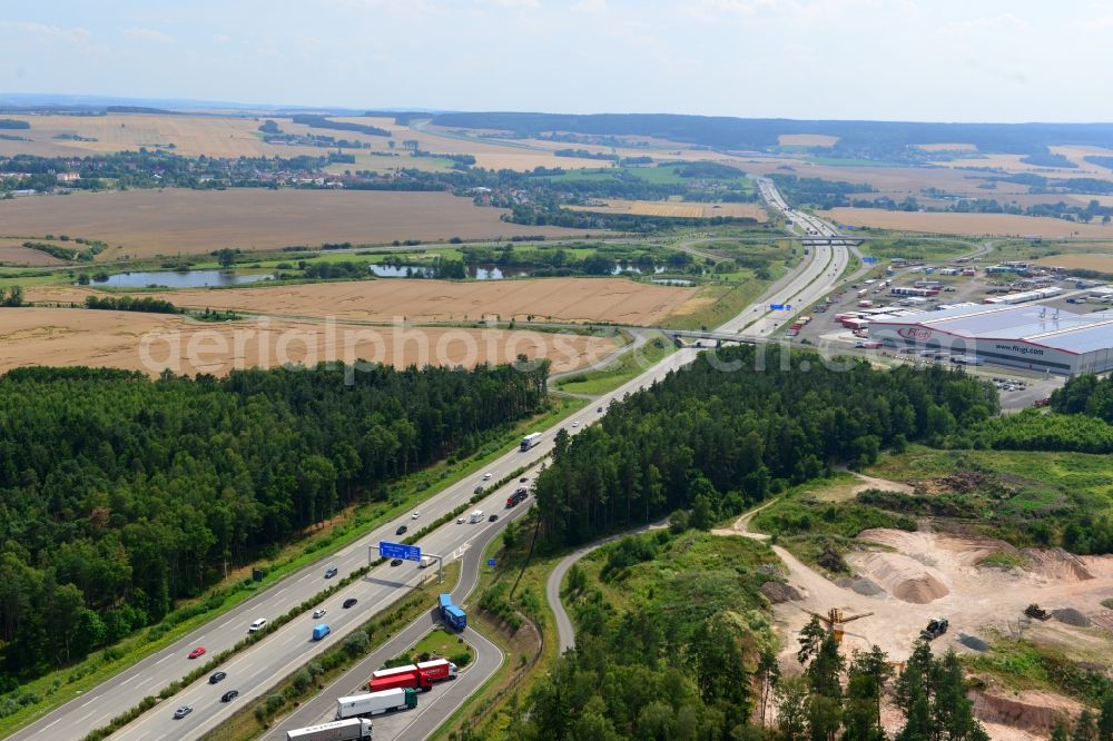 Aerial image Triptis - Buildings and route of the motorway A9 motorway with four lanes now. Currently, reconstruction, expansion and new construction work is underway for the six-lane expansion of Highway 9 between Triptis and Schleiz by Wayss & Freytag Ingenieurbau and EUROVIA VINCI in Thuringia