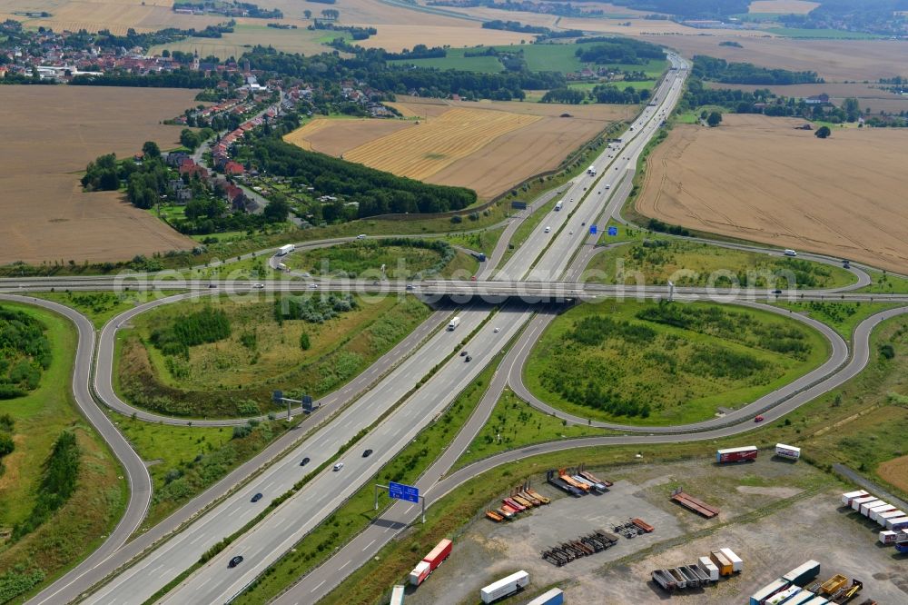 Triptis from the bird's eye view: Buildings and route of the motorway A9 motorway with four lanes now. Currently, reconstruction, expansion and new construction work is underway for the six-lane expansion of Highway 9 between Triptis and Schleiz by Wayss & Freytag Ingenieurbau and EUROVIA VINCI in Thuringia