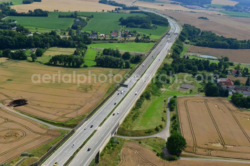 Triptis from above - Buildings and route of the motorway A9 motorway with four lanes now. Currently, reconstruction, expansion and new construction work is underway for the six-lane expansion of Highway 9 between Triptis and Schleiz by Wayss & Freytag Ingenieurbau and EUROVIA VINCI in Thuringia