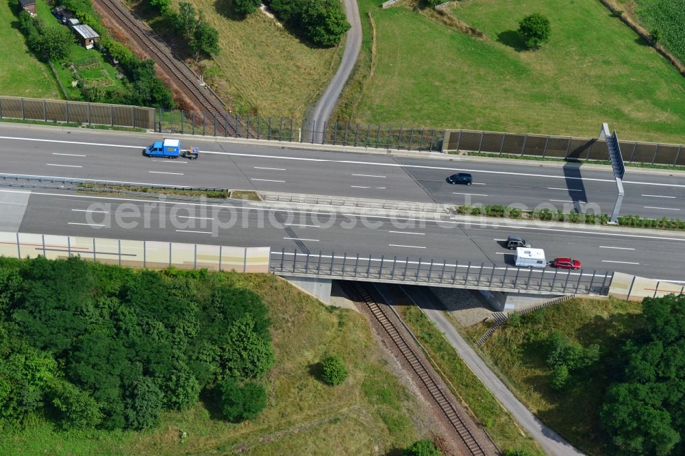 Aerial photograph Triptis - Buildings and route of the motorway A9 motorway with four lanes now. Currently, reconstruction, expansion and new construction work is underway for the six-lane expansion of Highway 9 between Triptis and Schleiz by Wayss & Freytag Ingenieurbau and EUROVIA VINCI in Thuringia