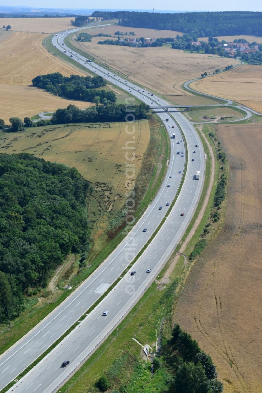 Triptis from above - Buildings and route of the motorway A9 motorway with four lanes now. Currently, reconstruction, expansion and new construction work is underway for the six-lane expansion of Highway 9 between Triptis and Schleiz by Wayss & Freytag Ingenieurbau and EUROVIA VINCI in Thuringia