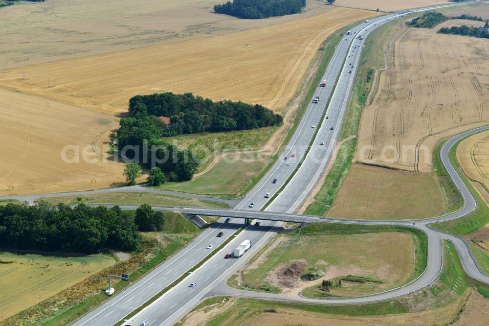 Aerial photograph Triptis - Buildings and route of the motorway A9 motorway with four lanes now. Currently, reconstruction, expansion and new construction work is underway for the six-lane expansion of Highway 9 between Triptis and Schleiz by Wayss & Freytag Ingenieurbau and EUROVIA VINCI in Thuringia