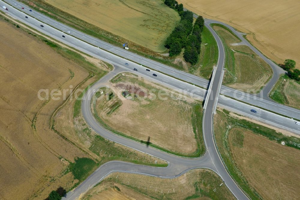 Triptis from the bird's eye view: Buildings and route of the motorway A9 motorway with four lanes now. Currently, reconstruction, expansion and new construction work is underway for the six-lane expansion of Highway 9 between Triptis and Schleiz by Wayss & Freytag Ingenieurbau and EUROVIA VINCI in Thuringia