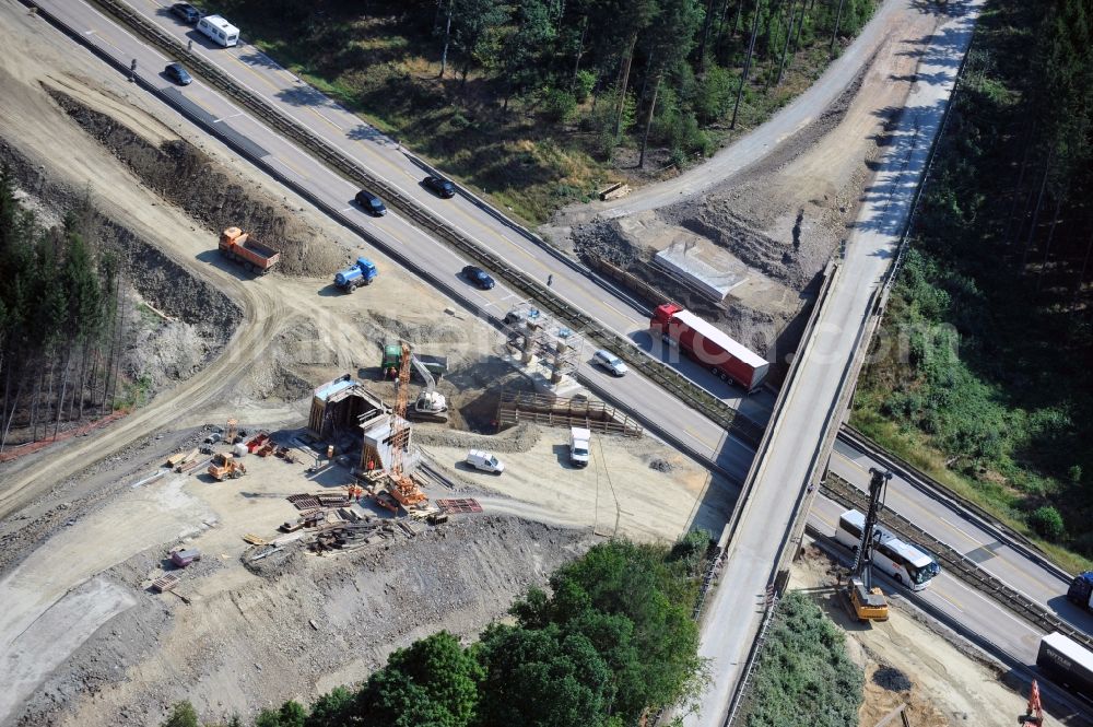 Aerial photograph Wüstenwetzdorf - Buildings and route of the motorway A9 motorway with four lanes now. Currently, reconstruction, expansion and new construction work is underway for the six-lane expansion of Highway 9 between Triptis and Schleiz by Wayss & Freytag Ingenieurbau and EUROVIA VINCI in Thuringia