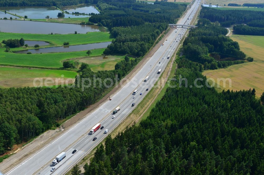 Wüstenwetzdorf from above - Buildings and route of the motorway A9 motorway with four lanes now. Currently, reconstruction, expansion and new construction work is underway for the six-lane expansion of Highway 9 between Triptis and Schleiz by Wayss & Freytag Ingenieurbau and EUROVIA VINCI in Thuringia