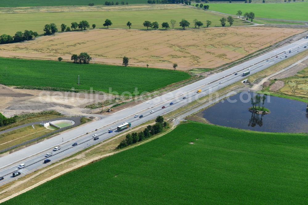 Aerial image Wüstenwetzdorf - Buildings and route of the motorway A9 motorway with four lanes now. Currently, reconstruction, expansion and new construction work is underway for the six-lane expansion of Highway 9 between Triptis and Schleiz by Wayss & Freytag Ingenieurbau and EUROVIA VINCI in Thuringia