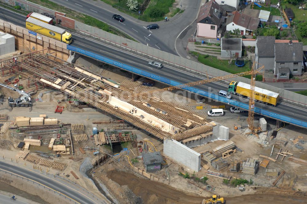 Aerial image Braunschweig - Blick auf den Um- und Ausbau des Autobahndreieck Braunschweig-Südwest an der Autobahn A29 / A 391. Der EUROVIA Baukonzern errichtet hier einige Brückenneubauten. Bauherr ist die Niedersächsische Landesbehörde für Straßenbau und Verkehr. View of the implementation and expansion of the motorway junction Braunschweig-southwest along the highway A29 / A 395th The construction company built EUROVIA here are some new bridges. Owner is the Lower Saxony state authorities for road construction and transport.