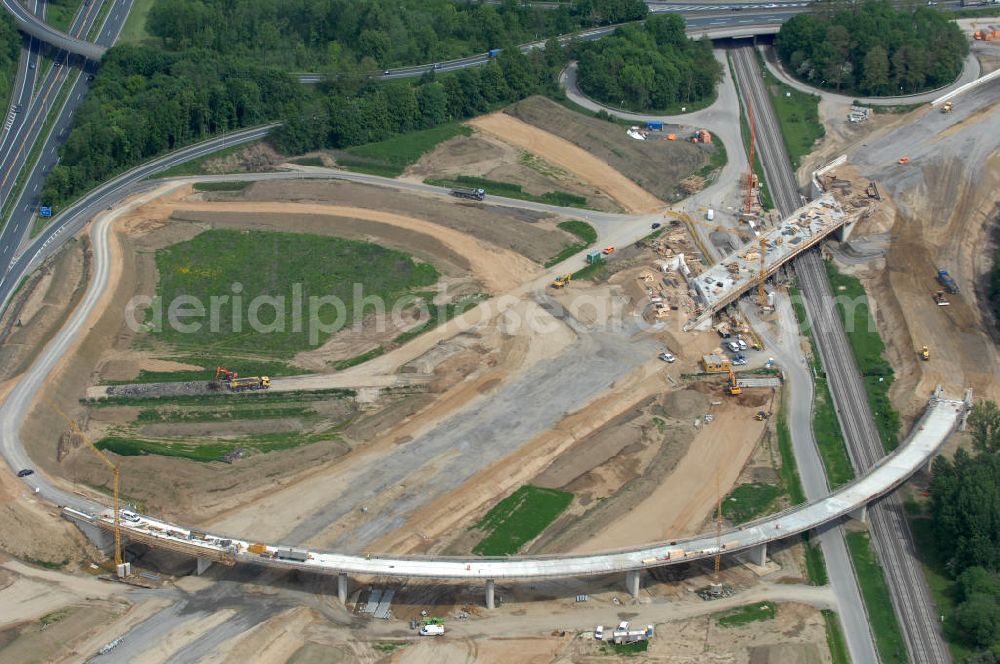 Aerial photograph Braunschweig - Blick auf den Um- und Ausbau des Autobahndreieck Braunschweig-Südwest an der Autobahn A29 / A 391. Der EUROVIA Baukonzern errichtet hier einige Brückenneubauten. Bauherr ist die Niedersächsische Landesbehörde für Straßenbau und Verkehr. View of the implementation and expansion of the motorway junction Braunschweig-southwest along the highway A29 / A 395th The construction company built EUROVIA here are some new bridges. Owner is the Lower Saxony state authorities for road construction and transport.