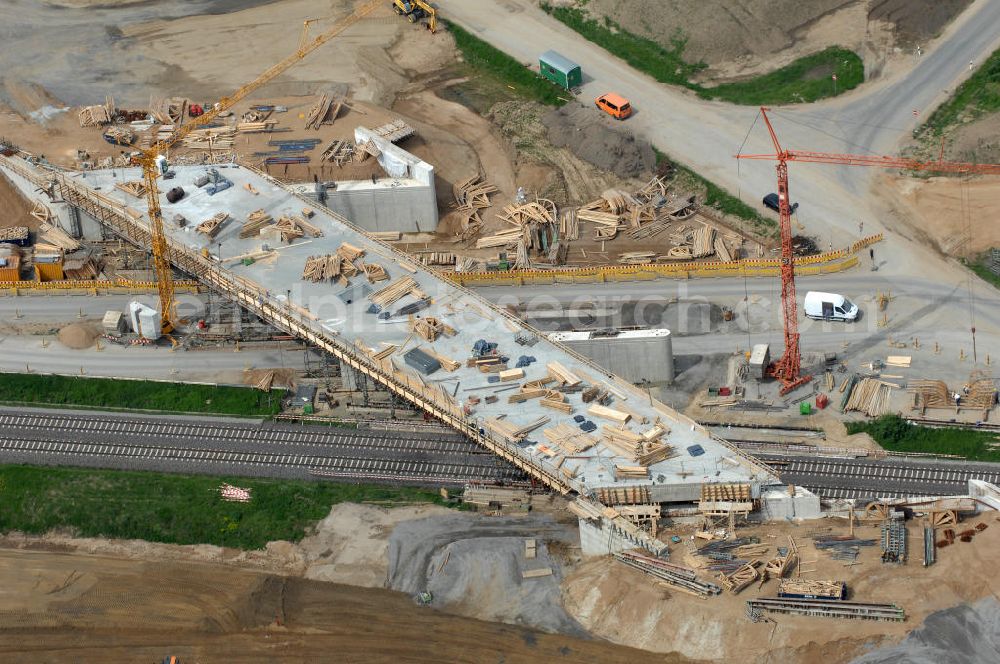 Aerial image Braunschweig - Blick auf den Um- und Ausbau des Autobahndreieck Braunschweig-Südwest an der Autobahn A29 / A 391. Der EUROVIA Baukonzern errichtet hier einige Brückenneubauten. Bauherr ist die Niedersächsische Landesbehörde für Straßenbau und Verkehr. View of the implementation and expansion of the motorway junction Braunschweig-southwest along the highway A29 / A 395th The construction company built EUROVIA here are some new bridges. Owner is the Lower Saxony state authorities for road construction and transport.