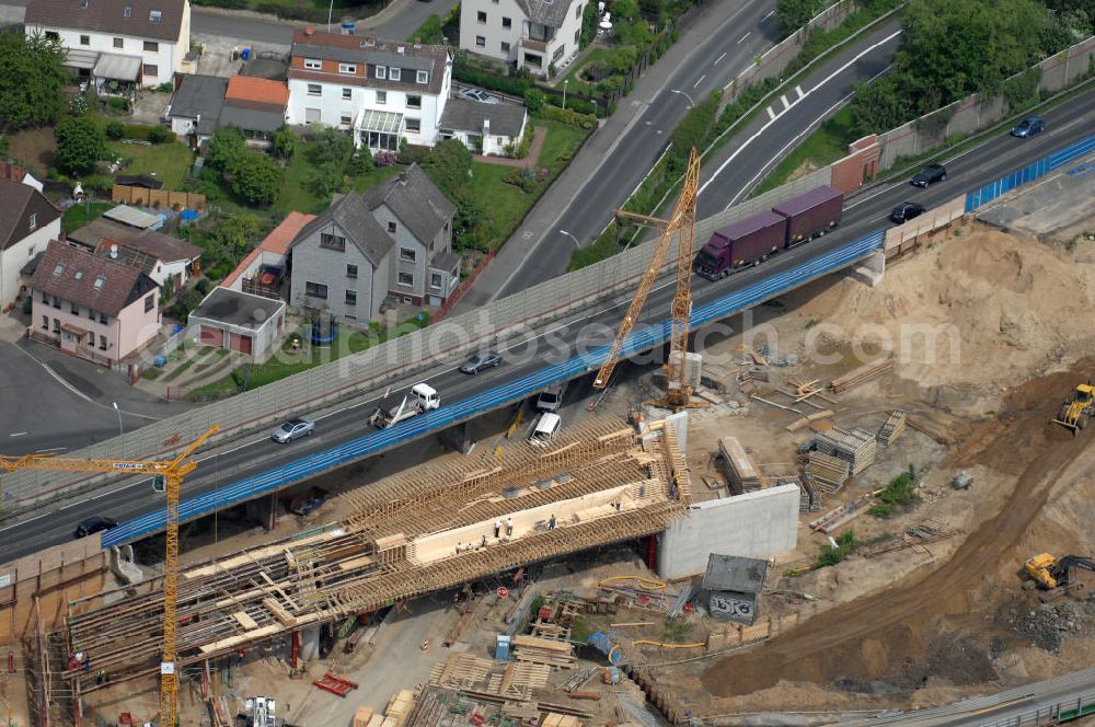 Aerial photograph Braunschweig - Blick auf den Um- und Ausbau des Autobahndreieck Braunschweig-Südwest an der Autobahn A29 / A 391. Der EUROVIA Baukonzern errichtet hier einige Brückenneubauten. Bauherr ist die Niedersächsische Landesbehörde für Straßenbau und Verkehr. View of the implementation and expansion of the motorway junction Braunschweig-southwest along the highway A29 / A 395th The construction company built EUROVIA here are some new bridges. Owner is the Lower Saxony state authorities for road construction and transport.