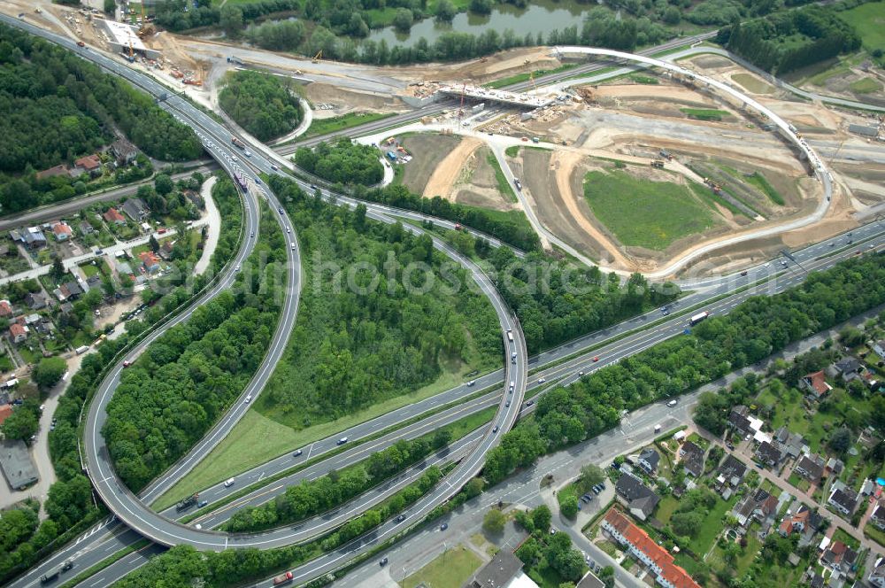 Braunschweig from the bird's eye view: Blick auf den Um- und Ausbau des Autobahndreieck Braunschweig-Südwest an der Autobahn A29 / A 391. Der EUROVIA Baukonzern errichtet hier einige Brückenneubauten. Bauherr ist die Niedersächsische Landesbehörde für Straßenbau und Verkehr. View of the implementation and expansion of the motorway junction Braunschweig-southwest along the highway A29 / A 395th The construction company built EUROVIA here are some new bridges. Owner is the Lower Saxony state authorities for road construction and transport.