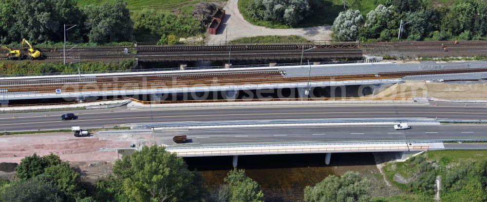 Dessau-Roßlau from the bird's eye view: Blick auf verschiedene Brückenbauwerke an der Baustelle zum Ausbau der B184 zwischen Dessau und Roßlau in Sachsen-Anhalt. Die B184 wird aufgrund des gestiegenen Verkehrsaufkommens zwischen 2006 und 2009 als vierstreifige Bundesstraße (RQ 20) über den Verlauf der Elbe hinweg ausgebaut. Bauherr ist der Landesbetrieb Bau Sachsen-Anhalt, die Projektleitung liegt bei SCHÜßLER - PLAN Berlin.View of different bridge structures on the site for the expansion of the B184 between Dessau and Roßlau in Saxony-Anhalt.