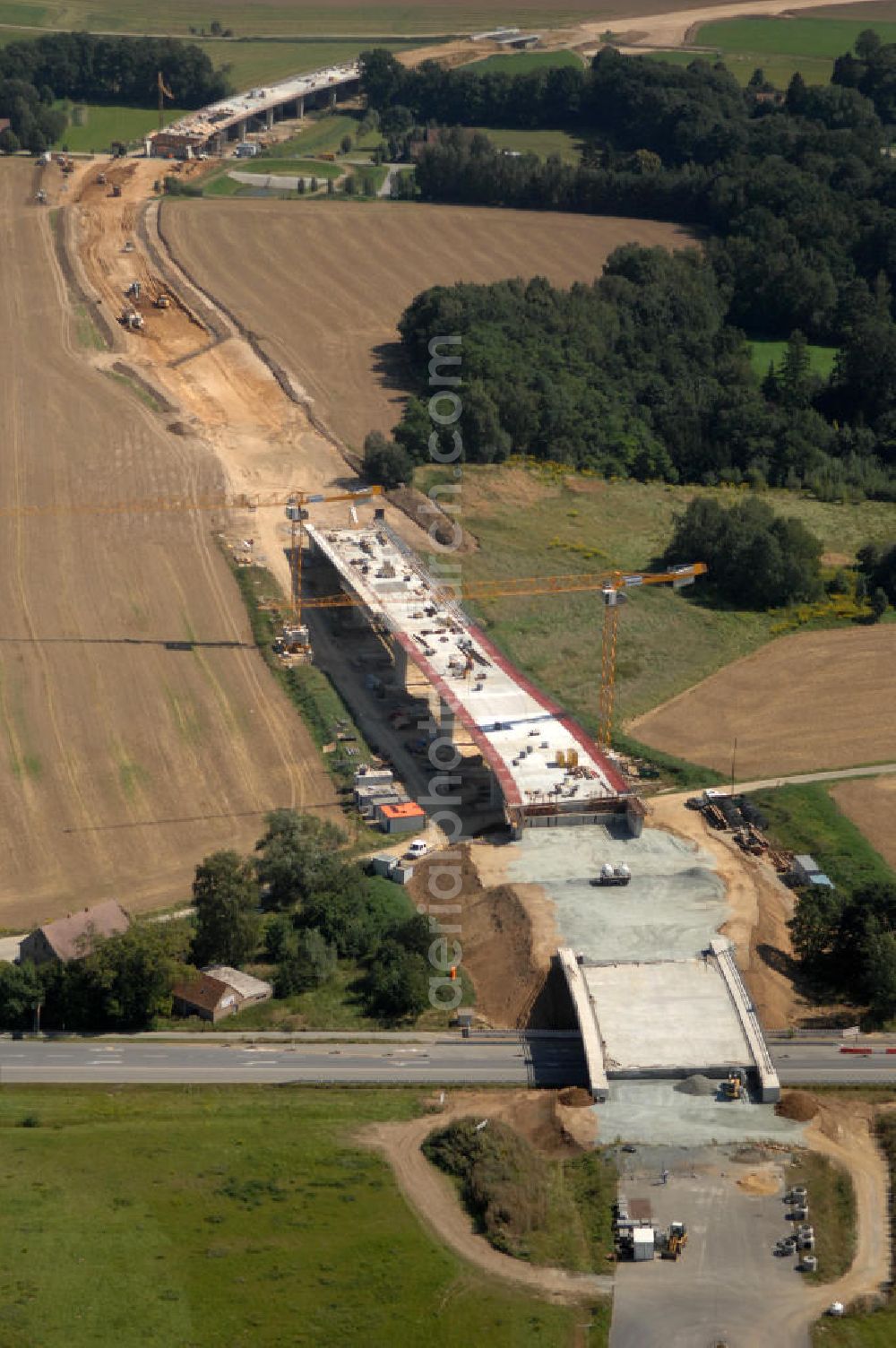 Löbau from the bird's eye view: Blick auf den Ausbau der B 178 an der Ortsumfahrung Löbau im Landkreis Görlitz in Sachsen. Im Zuge des Bauvorhabens B 178 Neuverlegung zwischen der BAB A 4 und der Bundesgrenze D / PL errichtet die Hentschke Bau GmbH die Neubaustrecke der B 178. Kontakt: Hentschke Bau GmbH, Tel. +49 (0) 359 167 030,