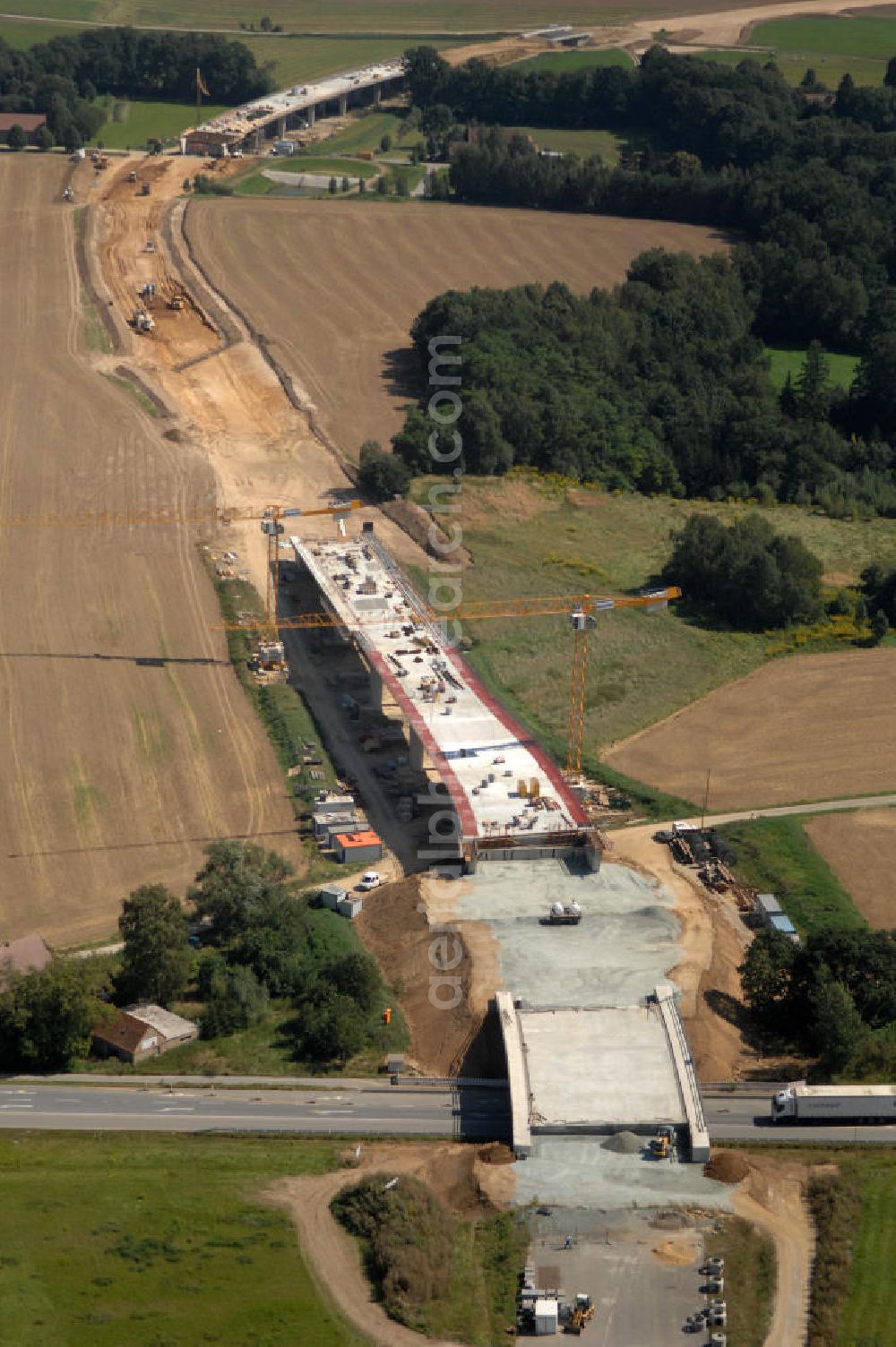 Aerial image Löbau - Blick auf den Ausbau der B 178 an der Ortsumfahrung Löbau im Landkreis Görlitz in Sachsen. Im Zuge des Bauvorhabens B 178 Neuverlegung zwischen der BAB A 4 und der Bundesgrenze D / PL errichtet die Hentschke Bau GmbH die Neubaustrecke der B 178. Kontakt: Hentschke Bau GmbH, Tel. +49 (0) 359 167 030,