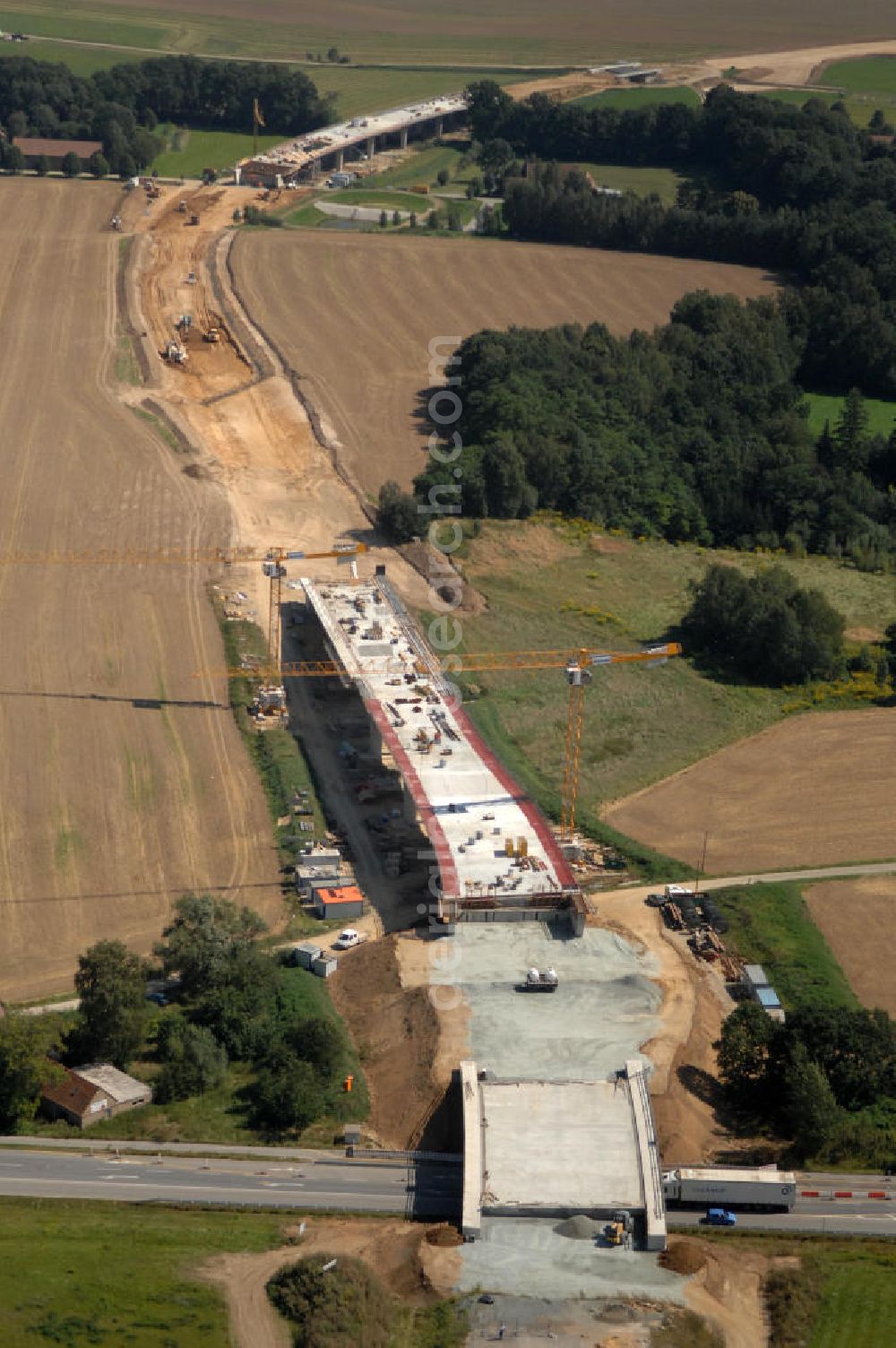 Aerial photograph Löbau - Blick auf den Ausbau der B 178 an der Ortsumfahrung Löbau im Landkreis Görlitz in Sachsen. Im Zuge des Bauvorhabens B 178 Neuverlegung zwischen der BAB A 4 und der Bundesgrenze D / PL errichtet die Hentschke Bau GmbH die Neubaustrecke der B 178. Kontakt: Hentschke Bau GmbH, Tel. +49 (0) 359 167 030,