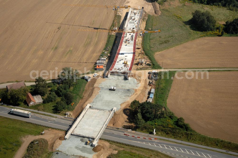 Löbau from the bird's eye view: Blick auf den Ausbau der B 178 an der Ortsumfahrung Löbau im Landkreis Görlitz in Sachsen. Im Zuge des Bauvorhabens B 178 Neuverlegung zwischen der BAB A 4 und der Bundesgrenze D / PL errichtet die Hentschke Bau GmbH die Neubaustrecke der B 178. Kontakt: Hentschke Bau GmbH, Tel. +49 (0) 359 167 030,