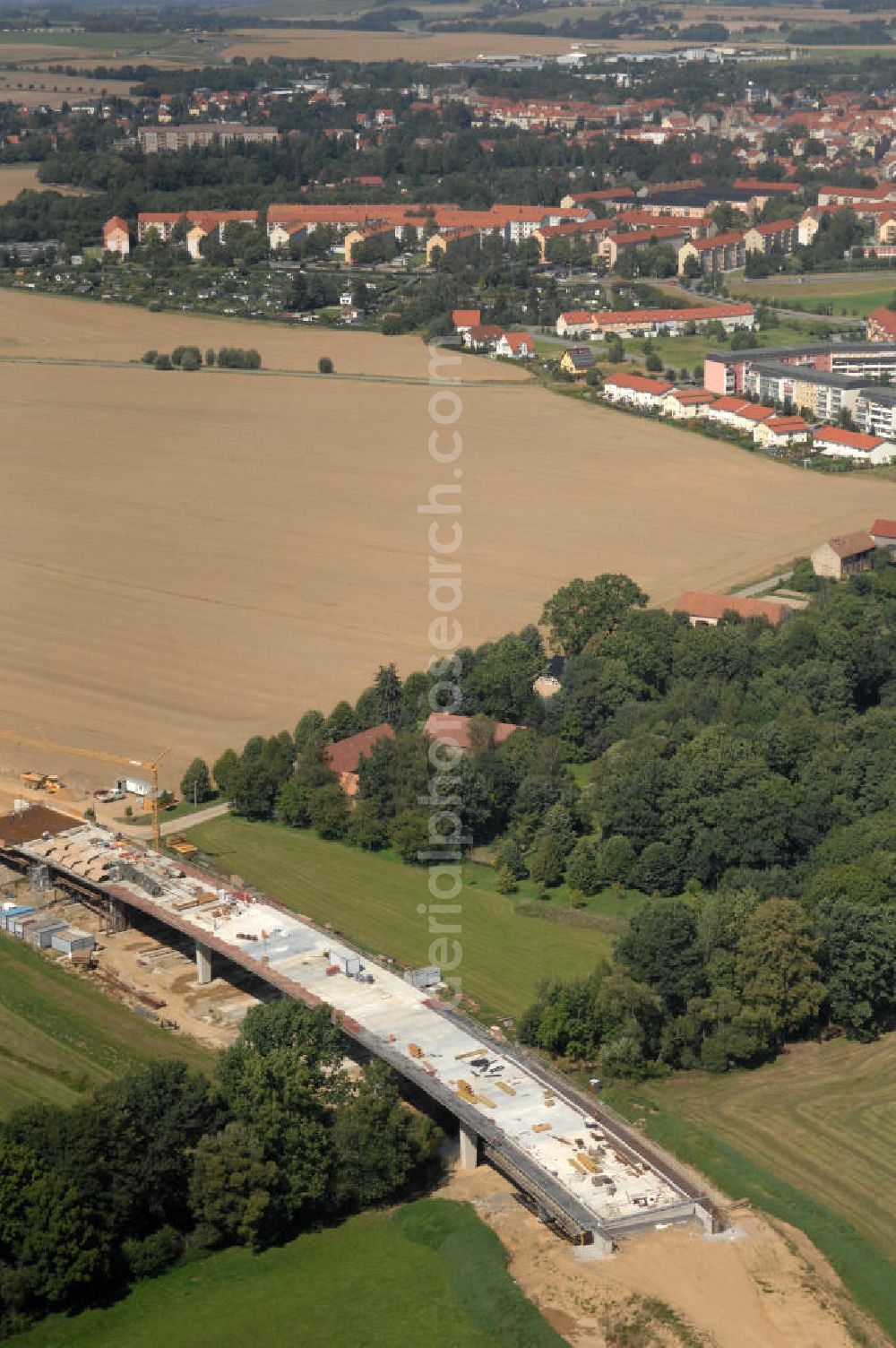 Löbau from the bird's eye view: Blick auf den Ausbau der B 178 an der Ortsumfahrung Löbau im Landkreis Görlitz in Sachsen. Im Zuge des Bauvorhabens B 178 Neuverlegung zwischen der BAB A 4 und der Bundesgrenze D / PL errichtet die Hentschke Bau GmbH die Neubaustrecke der B 178. Kontakt: Hentschke Bau GmbH, Tel. +49 (0) 359 167 030,