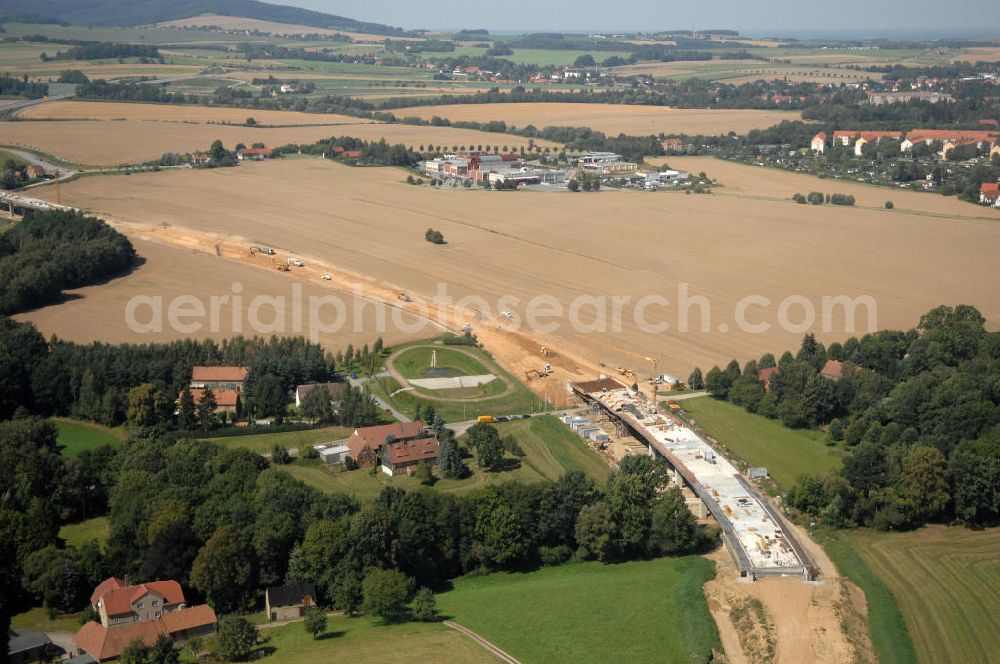 Aerial photograph Löbau - Blick auf den Ausbau der B 178 an der Ortsumfahrung Löbau im Landkreis Görlitz in Sachsen. Im Zuge des Bauvorhabens B 178 Neuverlegung zwischen der BAB A 4 und der Bundesgrenze D / PL errichtet die Hentschke Bau GmbH die Neubaustrecke der B 178. Kontakt: Hentschke Bau GmbH, Tel. +49 (0) 359 167 030,