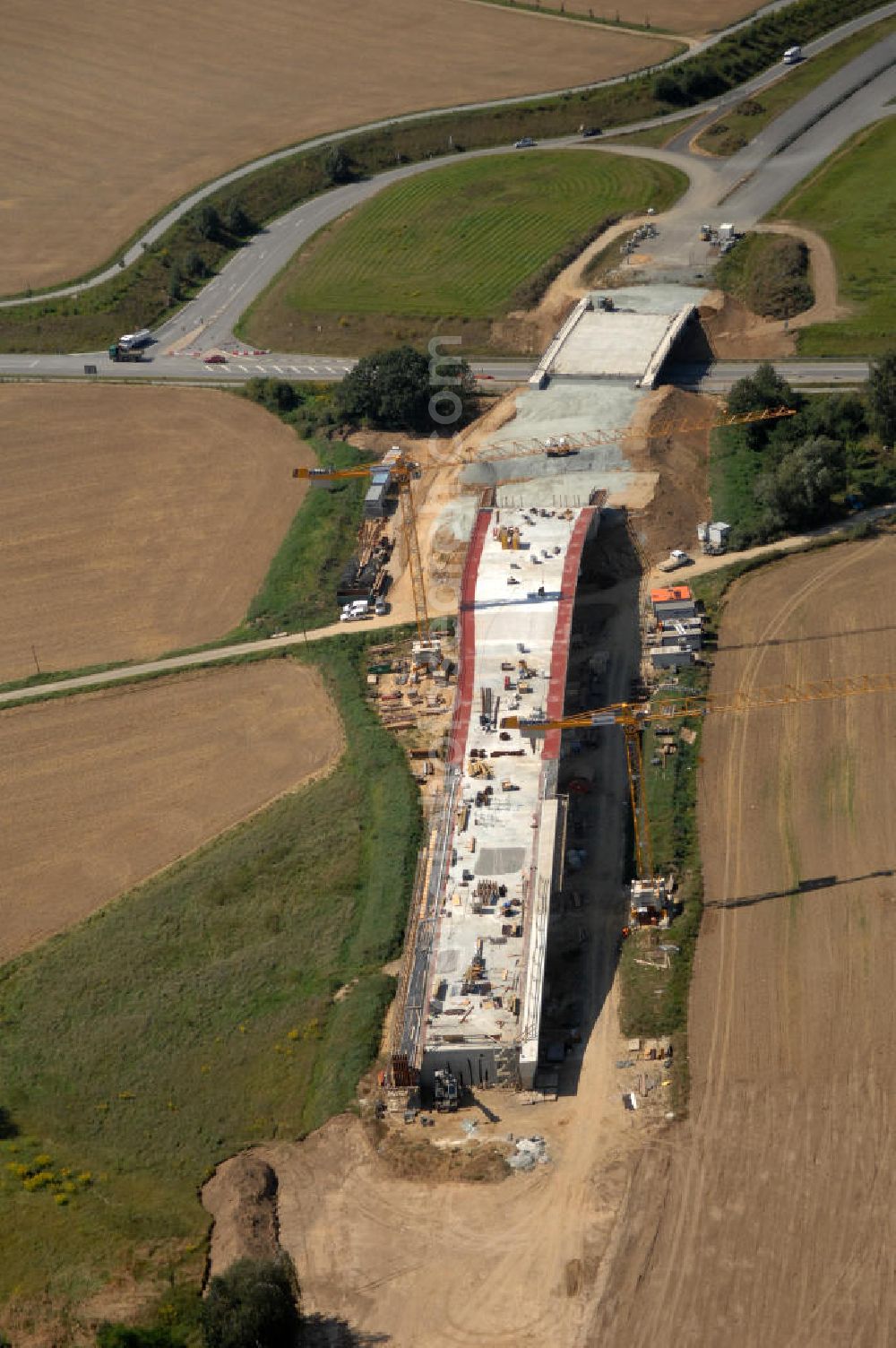 Löbau from the bird's eye view: Blick auf den Ausbau der B 178 an der Ortsumfahrung Löbau im Landkreis Görlitz in Sachsen. Im Zuge des Bauvorhabens B 178 Neuverlegung zwischen der BAB A 4 und der Bundesgrenze D / PL errichtet die Hentschke Bau GmbH die Neubaustrecke der B 178. Kontakt: Hentschke Bau GmbH, Tel. +49 (0) 359 167 030,