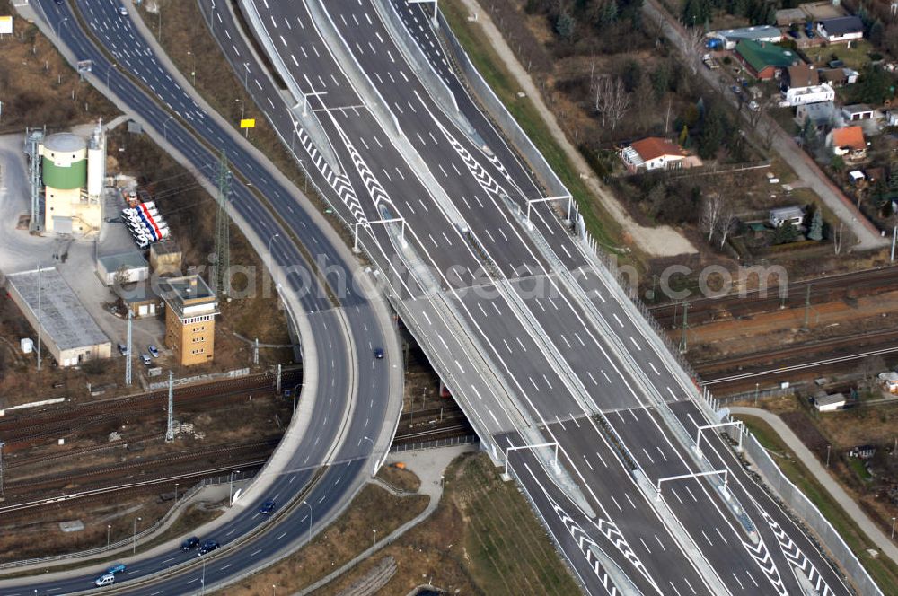 Schönefeld from the bird's eye view: Blick auf den Ausbau der A113n als südöstliches Tor zur Hauptstadt. Unter Berücksichtigung des Flughafen Berlin Brandenburg International wurde eine Verkehrskonzeption für den Ausbau des Straßennetzes im Raum Berlin-Schönefeld erarbeitet, die zwei Stufen umfasste. Die erste Stufe sah den vierstreifigen Ausbau der Bundesstraßen B 96a und B 179 mit der Anbindung des Flughafens über zwei Knotenpunkte vor. Inhalt der zweiten Stufe war der Anschluß der Bundesautobahn A 113 neu an die B 9?????????????????????????????????????????????????????????????????