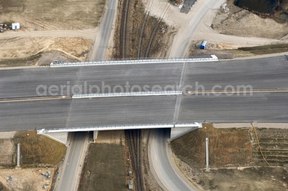 Schönefeld from the bird's eye view: Blick auf den Ausbau der A113n als südöstliches Tor zur Hauptstadt. Unter Berücksichtigung des Flughafen Berlin Brandenburg International wurde eine Verkehrskonzeption für den Ausbau des Straßennetzes im Raum Berlin-Schönefeld erarbeitet, die zwei Stufen umfasste. Die erste Stufe sah den vierstreifigen Ausbau der Bundesstraßen B 96a und B 179 mit der Anbindung des Flughafens über zwei Knotenpunkte vor. Inhalt der zweiten Stufe war der Anschluß der Bundesautobahn A 113 neu an die B 9?????????????????????????????????????????????????????????????????