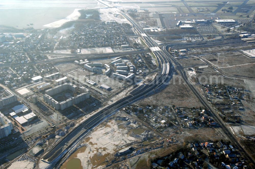 Aerial image Schönefeld - Blick auf den Ausbau der A113n als südöstliches Tor zur Hauptstadt. Unter Berücksichtigung des Flughafens Berlin Brandenburg International wurde eine Verkehrskonzeption für den Ausbau des Straßennetzes im Raum Berlin-Schönefeld erarbeitet, die zwei Stufen umfasste. Die erste Stufe sah den vierstreifigen Ausbau der Bundesstraßen B 96a und B 179 mit der Anbindung des Flughafens über zwei Knotenpunkte vor. Inhalt der zweiten Stufe war der Anschluß der Bundesautobahn A 113 neu an die B 96a und B 179. SCHÜßLER Plan Ingenieurgesellschaft, BATEG, EUROVIA