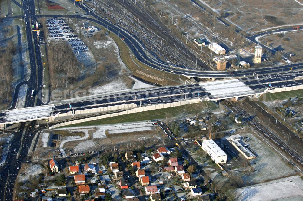 Aerial image Schönefeld - Blick auf den Ausbau der A113n als südöstliches Tor zur Hauptstadt. Unter Berücksichtigung des Flughafens Berlin Brandenburg International wurde eine Verkehrskonzeption für den Ausbau des Straßennetzes im Raum Berlin-Schönefeld erarbeitet, die zwei Stufen umfasste. Die erste Stufe sah den vierstreifigen Ausbau der Bundesstraßen B 96a und B 179 mit der Anbindung des Flughafens über zwei Knotenpunkte vor. Inhalt der zweiten Stufe war der Anschluß der Bundesautobahn A 113 neu an die B 96a und B 179. SCHÜßLER Plan Ingenieurgesellschaft, BATEG, EUROVIA