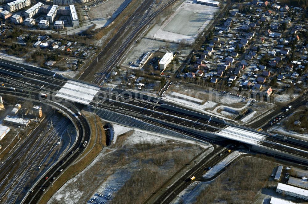 Aerial image Schönefeld - Blick auf den Ausbau der A113n als südöstliches Tor zur Hauptstadt. Unter Berücksichtigung des Flughafens Berlin Brandenburg International wurde eine Verkehrskonzeption für den Ausbau des Straßennetzes im Raum Berlin-Schönefeld erarbeitet, die zwei Stufen umfasste. Die erste Stufe sah den vierstreifigen Ausbau der Bundesstraßen B 96a und B 179 mit der Anbindung des Flughafens über zwei Knotenpunkte vor. Inhalt der zweiten Stufe war der Anschluß der Bundesautobahn A 113 neu an die B 96a und B 179. SCHÜßLER Plan Ingenieurgesellschaft, BATEG, EUROVIA