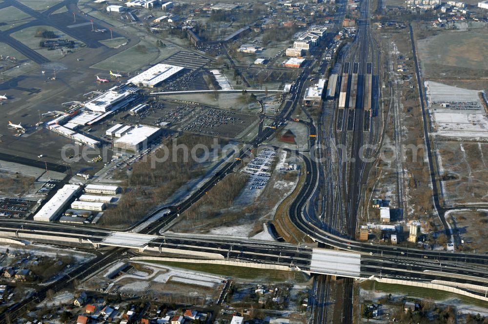 Schönefeld from the bird's eye view: Blick auf den Ausbau der A113n als südöstliches Tor zur Hauptstadt. Unter Berücksichtigung des Flughafens Berlin Brandenburg International wurde eine Verkehrskonzeption für den Ausbau des Straßennetzes im Raum Berlin-Schönefeld erarbeitet, die zwei Stufen umfasste. Die erste Stufe sah den vierstreifigen Ausbau der Bundesstraßen B 96a und B 179 mit der Anbindung des Flughafens über zwei Knotenpunkte vor. Inhalt der zweiten Stufe war der Anschluß der Bundesautobahn A 113 neu an die B 96a und B 179. SCHÜßLER Plan Ingenieurgesellschaft, BATEG, EUROVIA