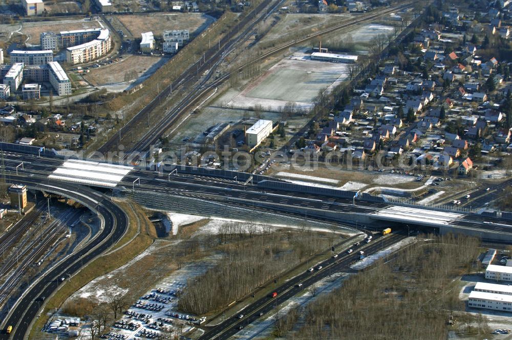 Schönefeld from the bird's eye view: Blick auf den Ausbau der A113n als südöstliches Tor zur Hauptstadt. Unter Berücksichtigung des Flughafens Berlin Brandenburg International wurde eine Verkehrskonzeption für den Ausbau des Straßennetzes im Raum Berlin-Schönefeld erarbeitet, die zwei Stufen umfasste. Die erste Stufe sah den vierstreifigen Ausbau der Bundesstraßen B 96a und B 179 mit der Anbindung des Flughafens über zwei Knotenpunkte vor. Inhalt der zweiten Stufe war der Anschluß der Bundesautobahn A 113 neu an die B 96a und B 179. SCHÜßLER Plan Ingenieurgesellschaft, BATEG, EUROVIA