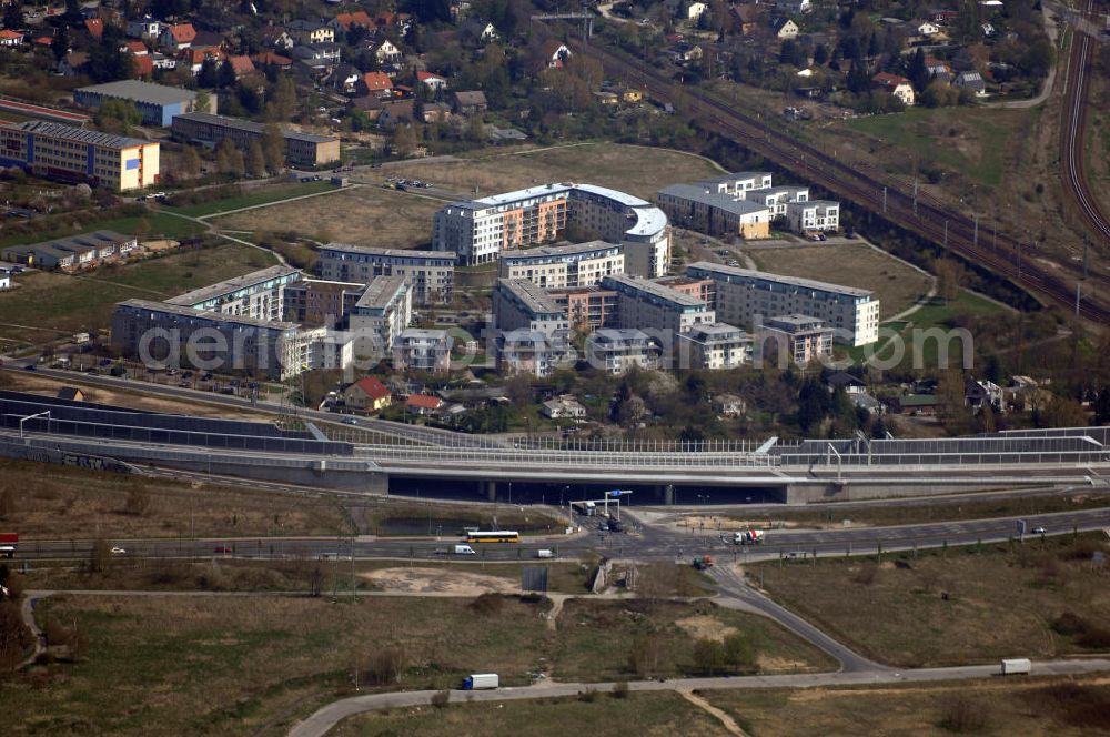 Aerial image Schönefeld - Blick auf den Bereich der Stadtautobahn / Zubringer A113n als südöstliches Tor zur Hauptstadt kurz vor der Verkehrsfreigabe. Unter Berücksichtigung des Flughafens Berlin Brandenburg International wurde eine Verkehrskonzeption für den Ausbau des Straßennetzes im Raum Berlin-Schönefeld erarbeitet, die zwei Stufen umfasste. Die erste Stufe sah den vierstreifigen Ausbau der Bundesstraßen B 96a und B 179 mit der Anbindung des Flughafens über zwei Knotenpunkte vor. Inhalt der zweiten Stufe war der Anschluß der Bundesautobahn A 113 neu an die B 96a und B 179. SCHÜßLER Plan Ingenieurgesellschaft, BATEG, EUROVIA, BERGER