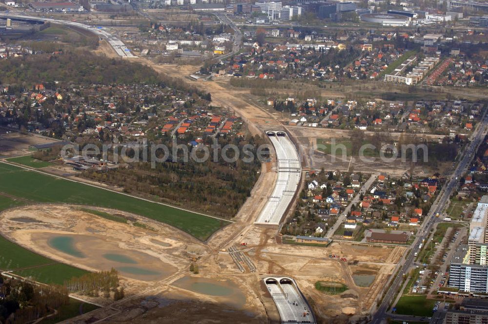 Aerial photograph Schönefeld - Blick auf den Bereich der Stadtautobahn / Zubringer A113n als südöstliches Tor zur Hauptstadt kurz vor der Verkehrsfreigabe. Unter Berücksichtigung des Flughafens Berlin Brandenburg International wurde eine Verkehrskonzeption für den Ausbau des Straßennetzes im Raum Berlin-Schönefeld erarbeitet, die zwei Stufen umfasste. Die erste Stufe sah den vierstreifigen Ausbau der Bundesstraßen B 96a und B 179 mit der Anbindung des Flughafens über zwei Knotenpunkte vor. Inhalt der zweiten Stufe war der Anschluß der Bundesautobahn A 113 neu an die B 96a und B 179. SCHÜßLER Plan Ingenieurgesellschaft, BATEG, EUROVIA, BERGER